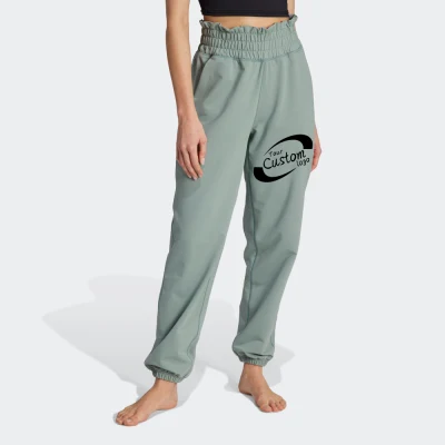 Pantaloni da donna all'ingrosso con tasche Pantaloni sportivi affusolati da yoga per allenamento a vita alta da donna
